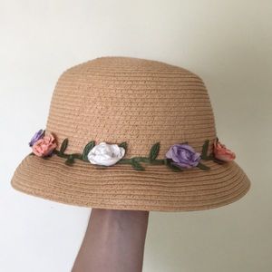 Vintage-inspired straw hat with paper flowers